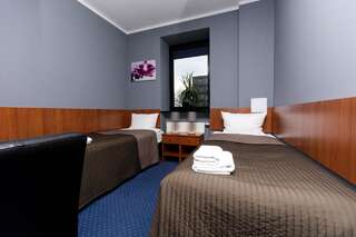 Отель Hotel Level Rypin Стандартный двухместный номер с 2 отдельными кроватями-2